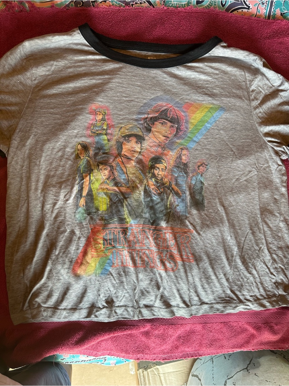 Netflix Gray Ringer Tee with Black Trim and Rainbow Graphic